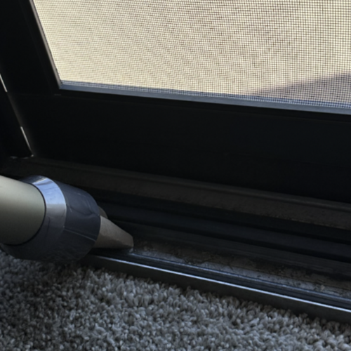 The Easiest Way to Clean Gunk Out of Your Sliding Door Track